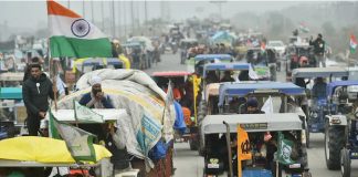 Farmers break police barricades at Delhi borders ahead of tractor rally
